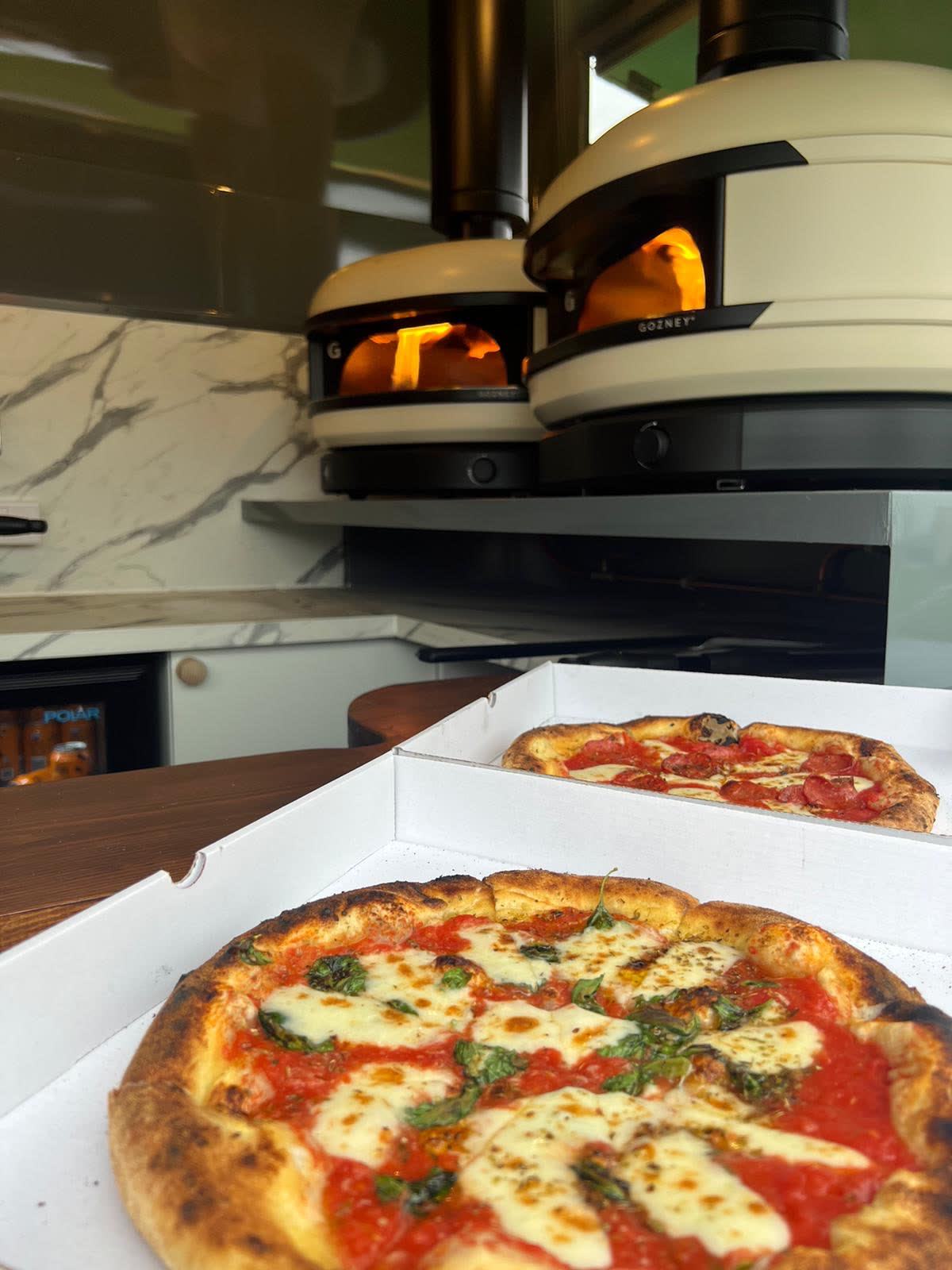 BBQ chicken pizza closeup with golden crust
